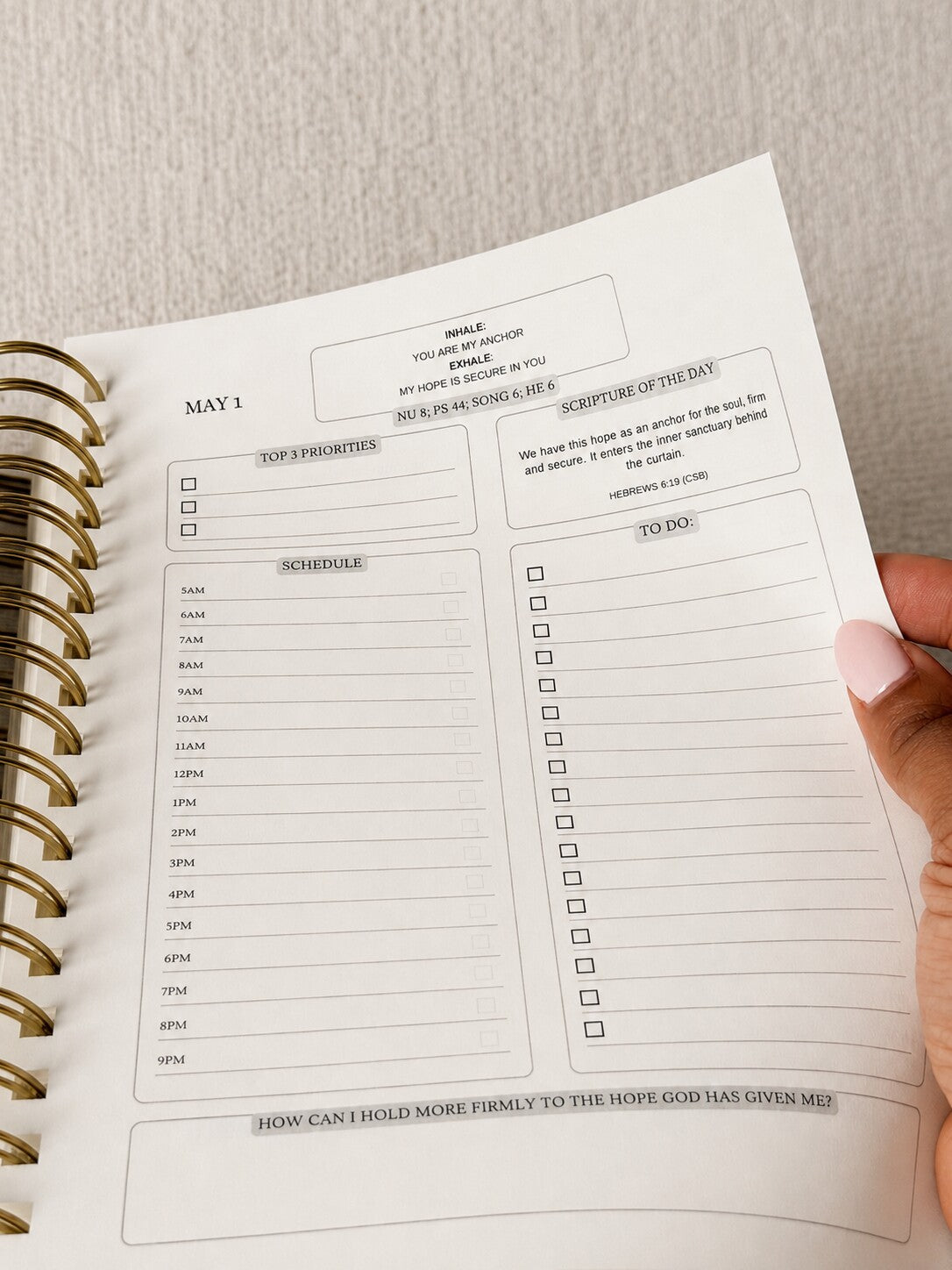 A daily page with the scripture of the day, a breath prayer, an hourly schedule and a to-do list